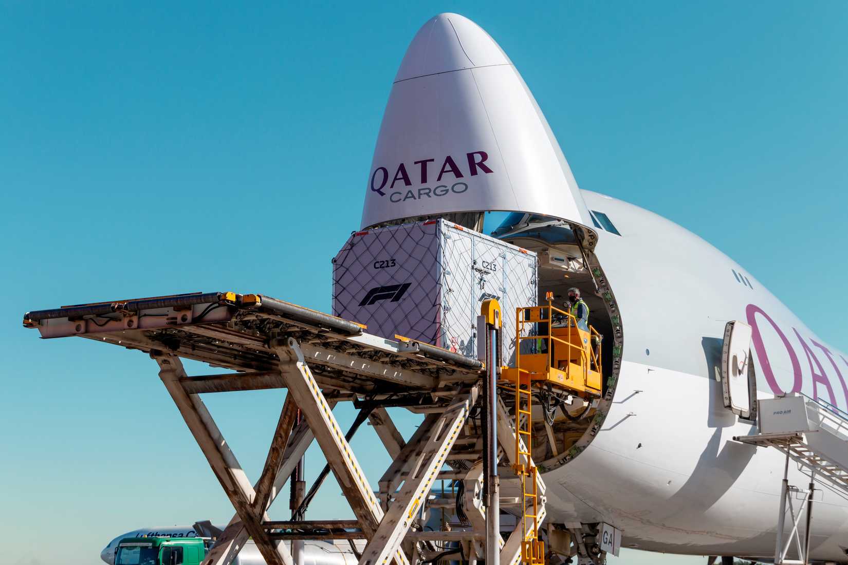 Qatar Cargo Boeing 747-8 being loaded with formula 1 container.