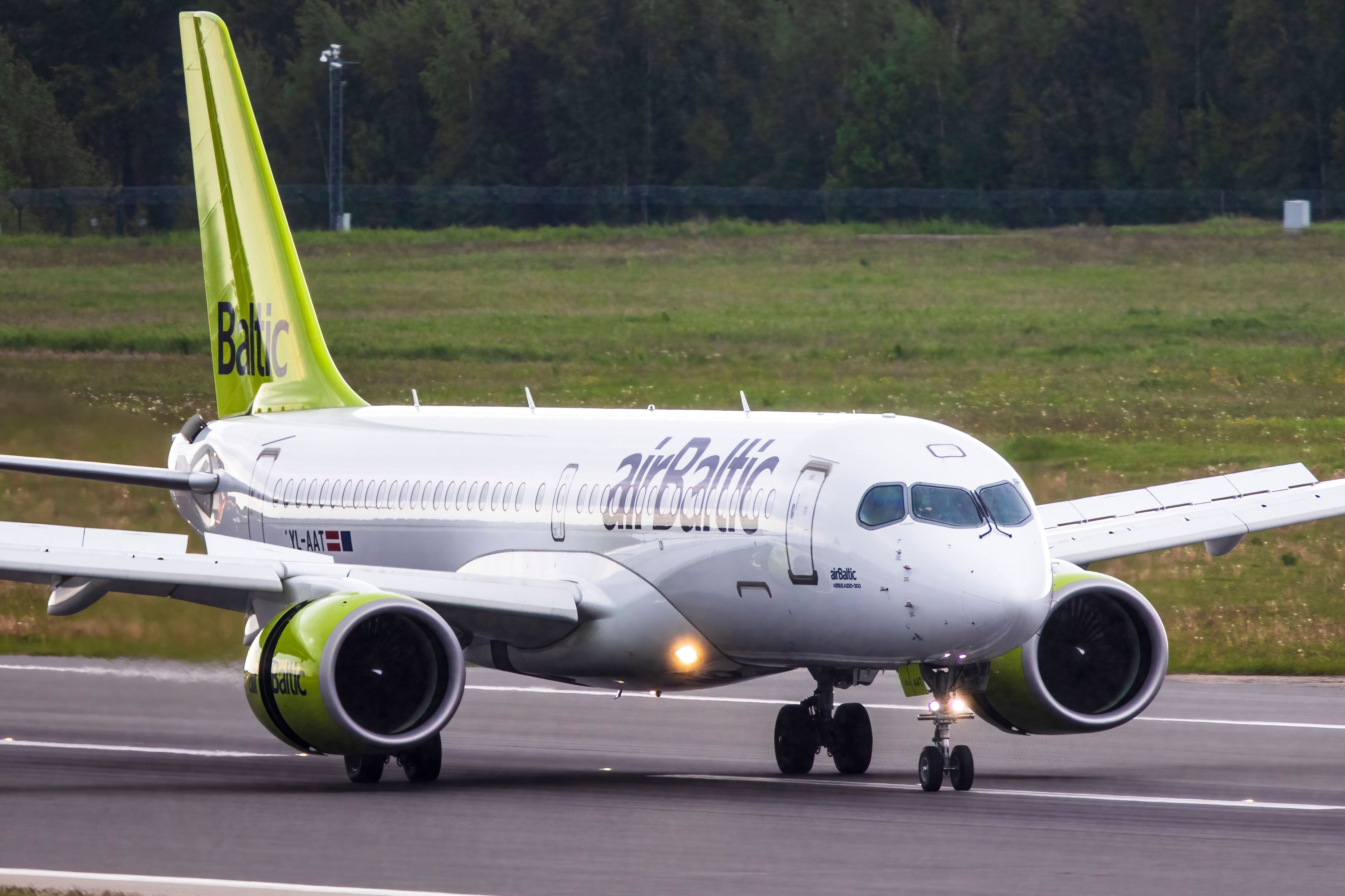 airBaltic Airbus A220 aircraft on runway