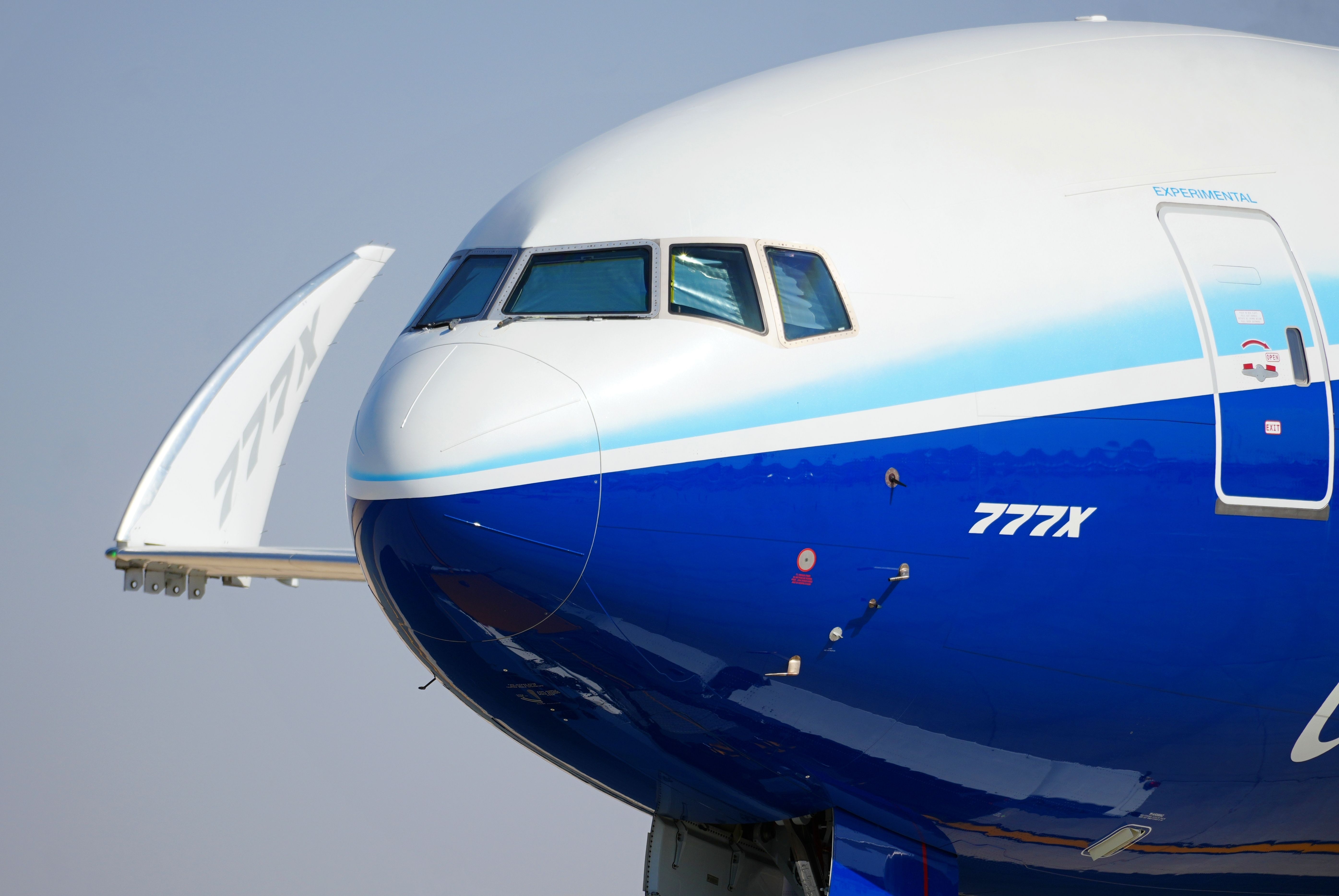 A Boeing 777X flight test vehicle taxis out to the runway for a flying display at the 2023 Dubai Airshow.