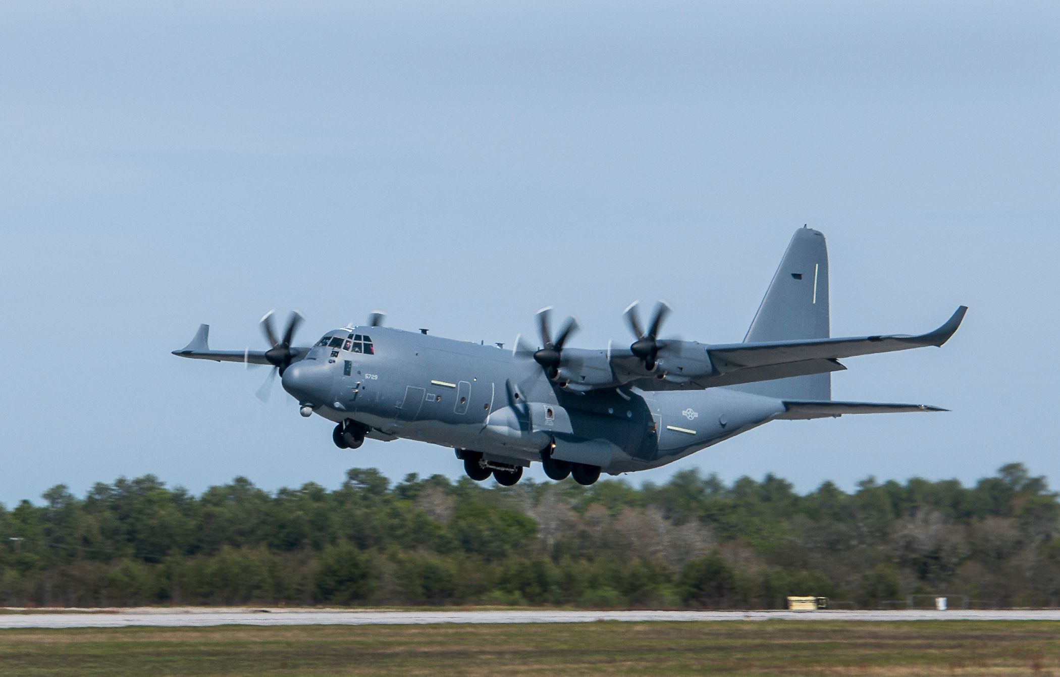 A modified MC-130J lifts off from Eglin Air Force Base, Fla., for a test mission.
