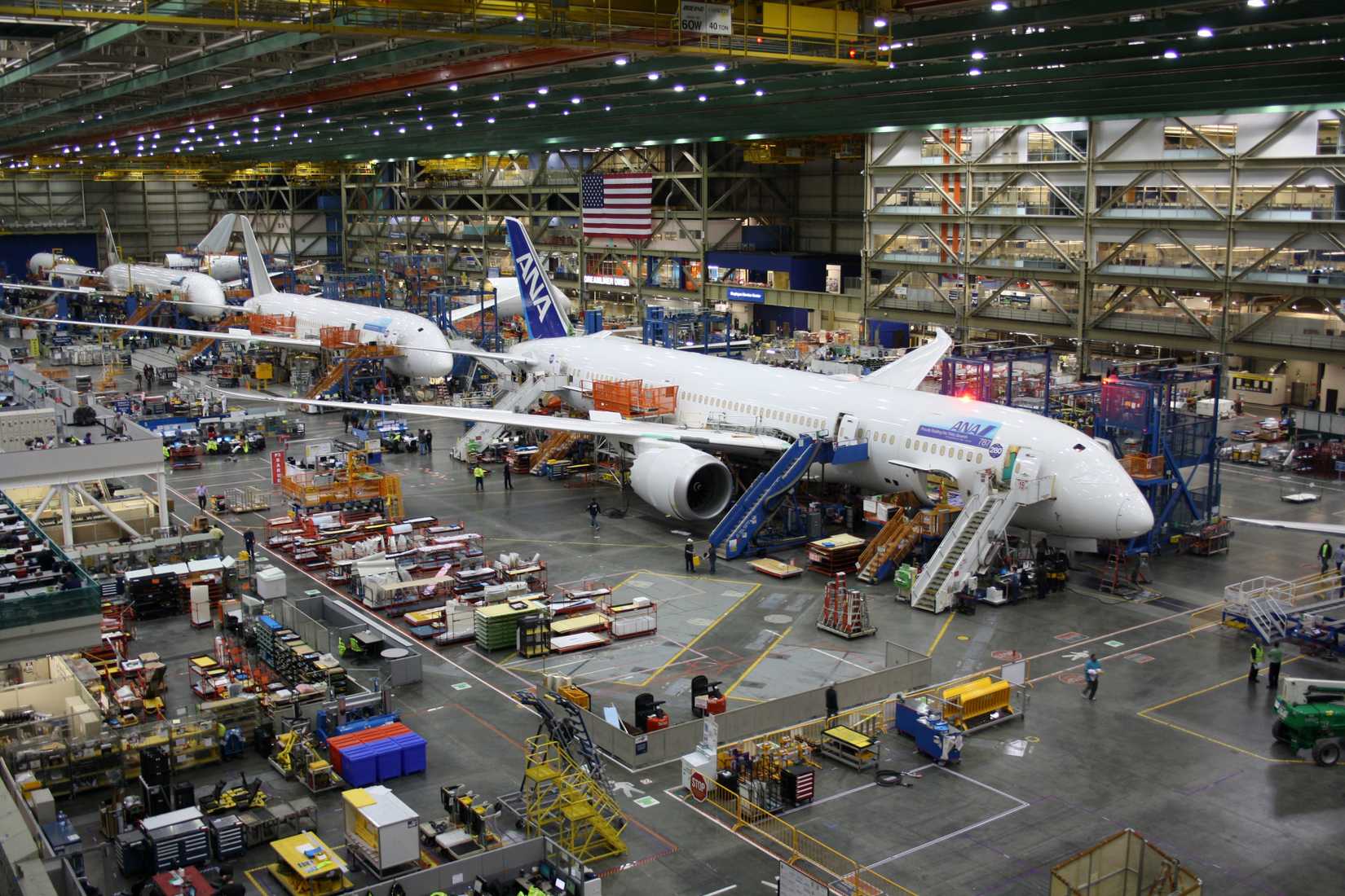 Boeing employees continue work building a Boeing 787 jets at its Everett factory, including for Japanese airline All Nippon Airways (ANA).
