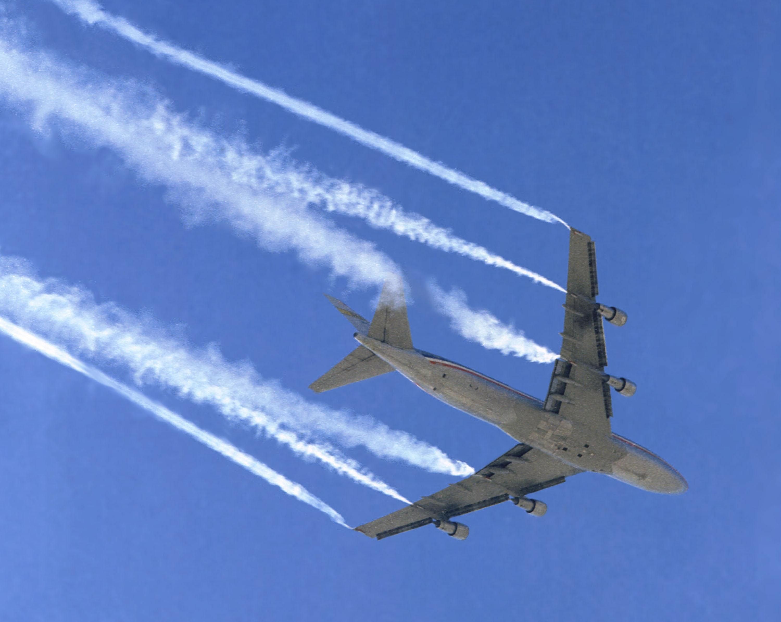 In this 1974 NASA Flight Research Center photograph, a Boeing B-747 jetliner is shown taking part in the trailing wake vortex study.