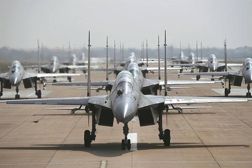PLA Air Force fighter jets glide on the runway in March, 2019.