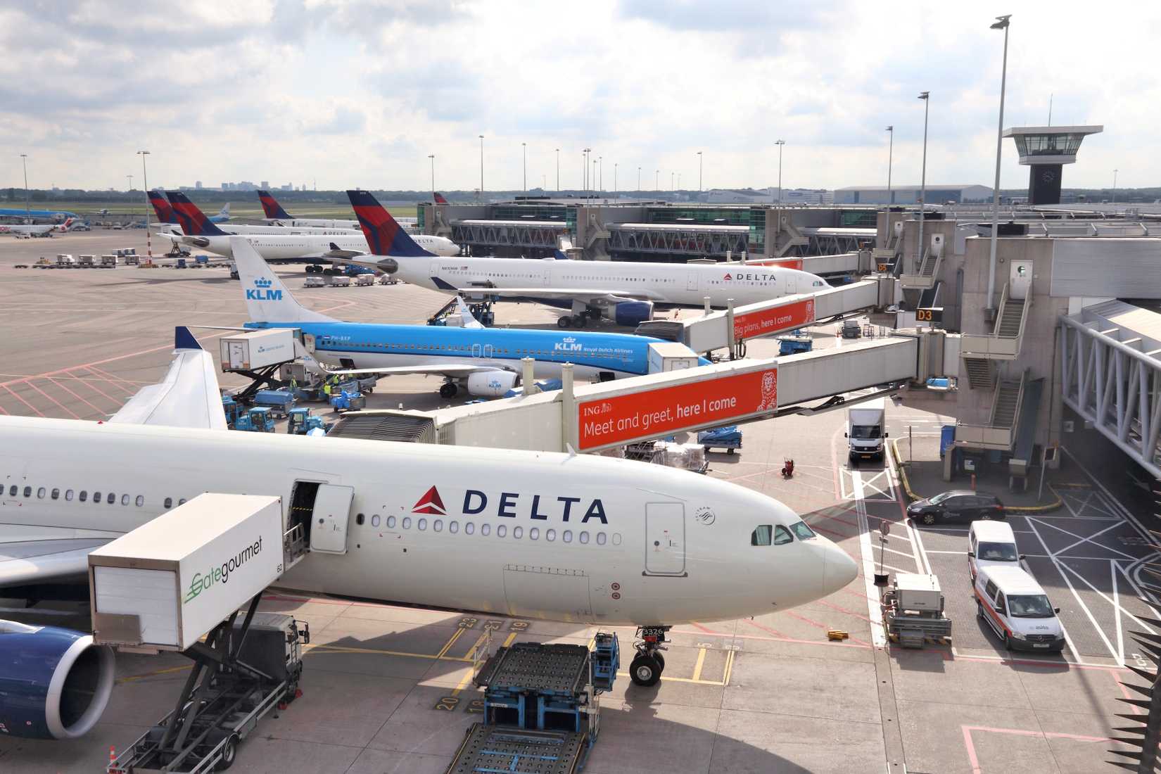 Delta Air Lines and KLM Aircraft parked side by side 